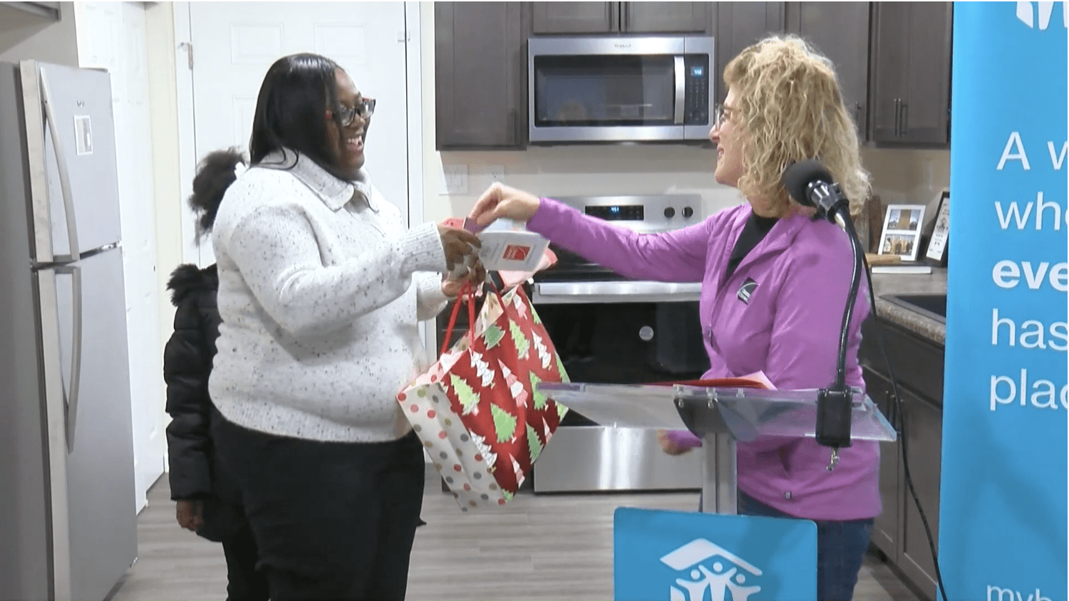 Maumee Valley Habitat for Humanity presents keys to south Toledo home to new owner