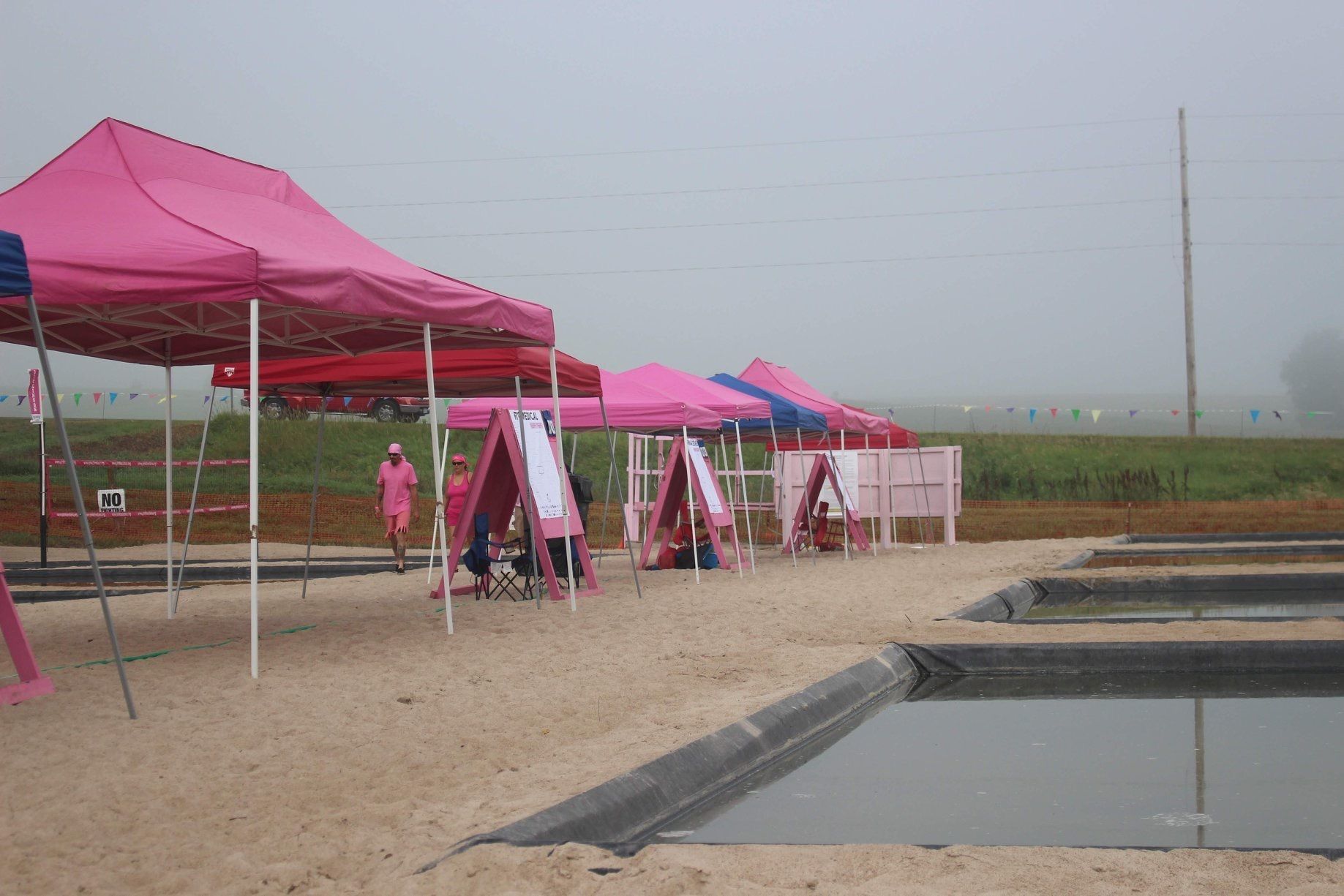 Claim your canopy spot for the Beat Breast Cancer Mud Volleyball Tournament. 