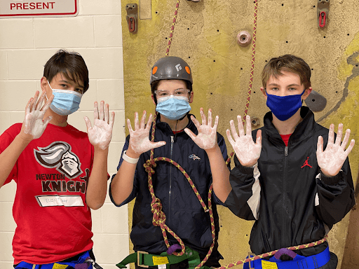 Kids rockclimbing.