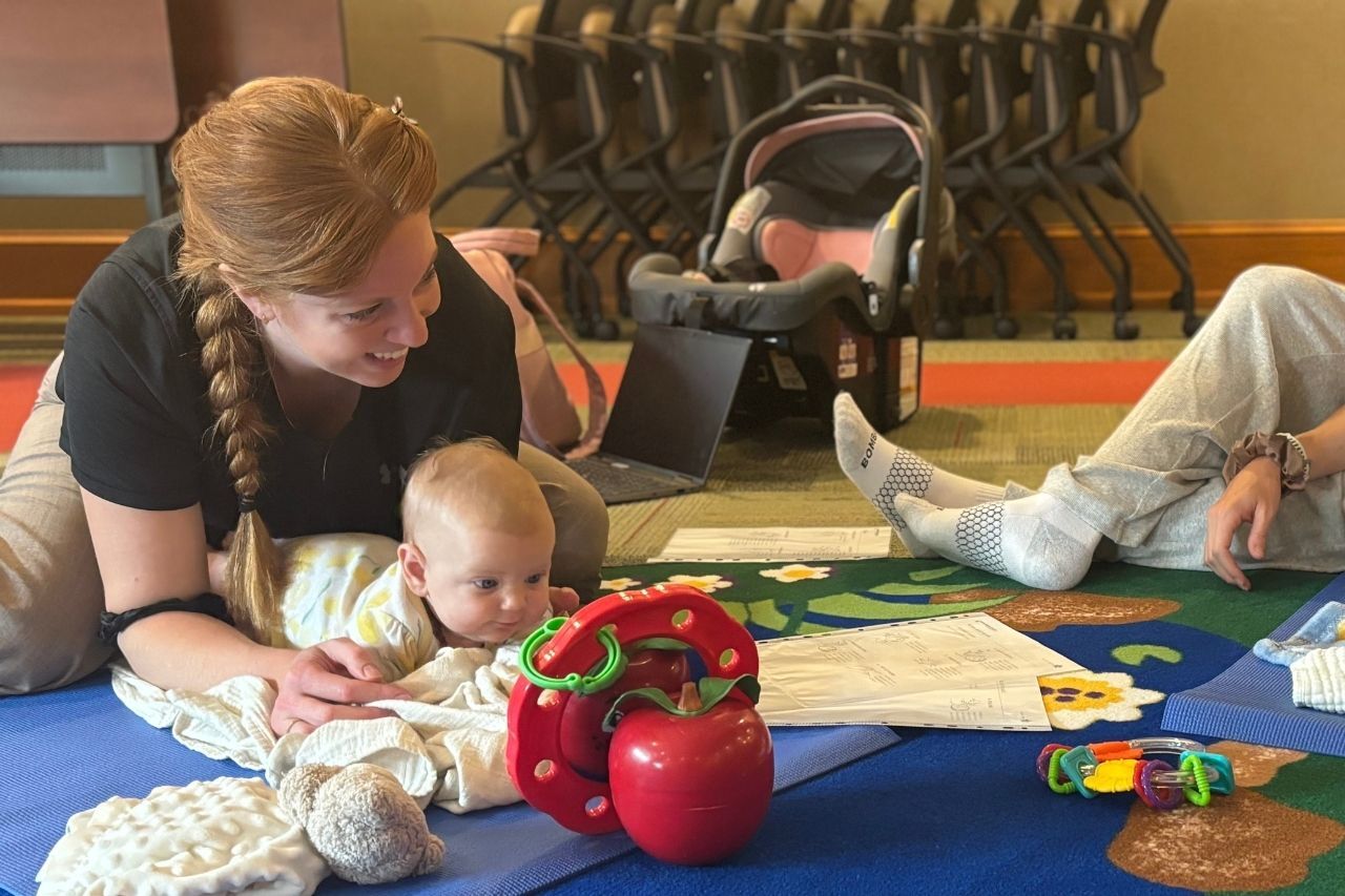 Mom and baby connecting at an infant massage class in Erie PA
