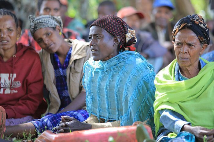 Women sitting.