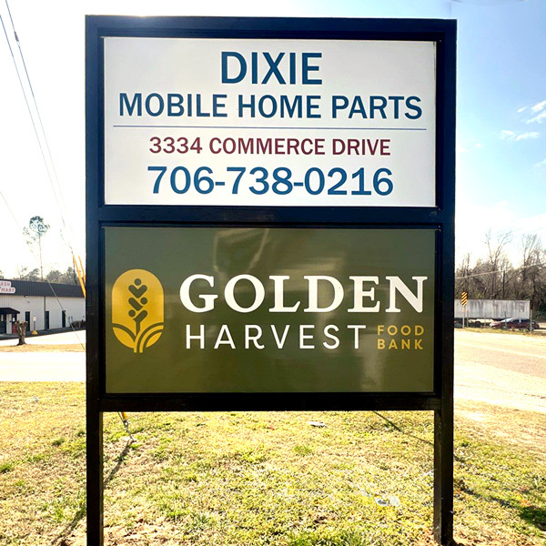 Exterior aluminum post and panel sign for Dixie Mobile Home Parts and Golden Harvest Food Bank, fabricated by Keen Signs and Graphics in Augusta, GA