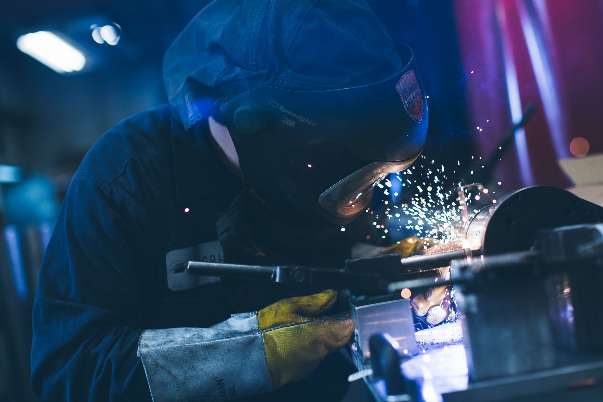 Person working on metalworking.