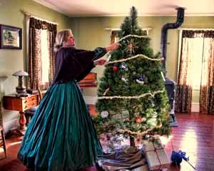 Interpreter decorating Christmas tree.