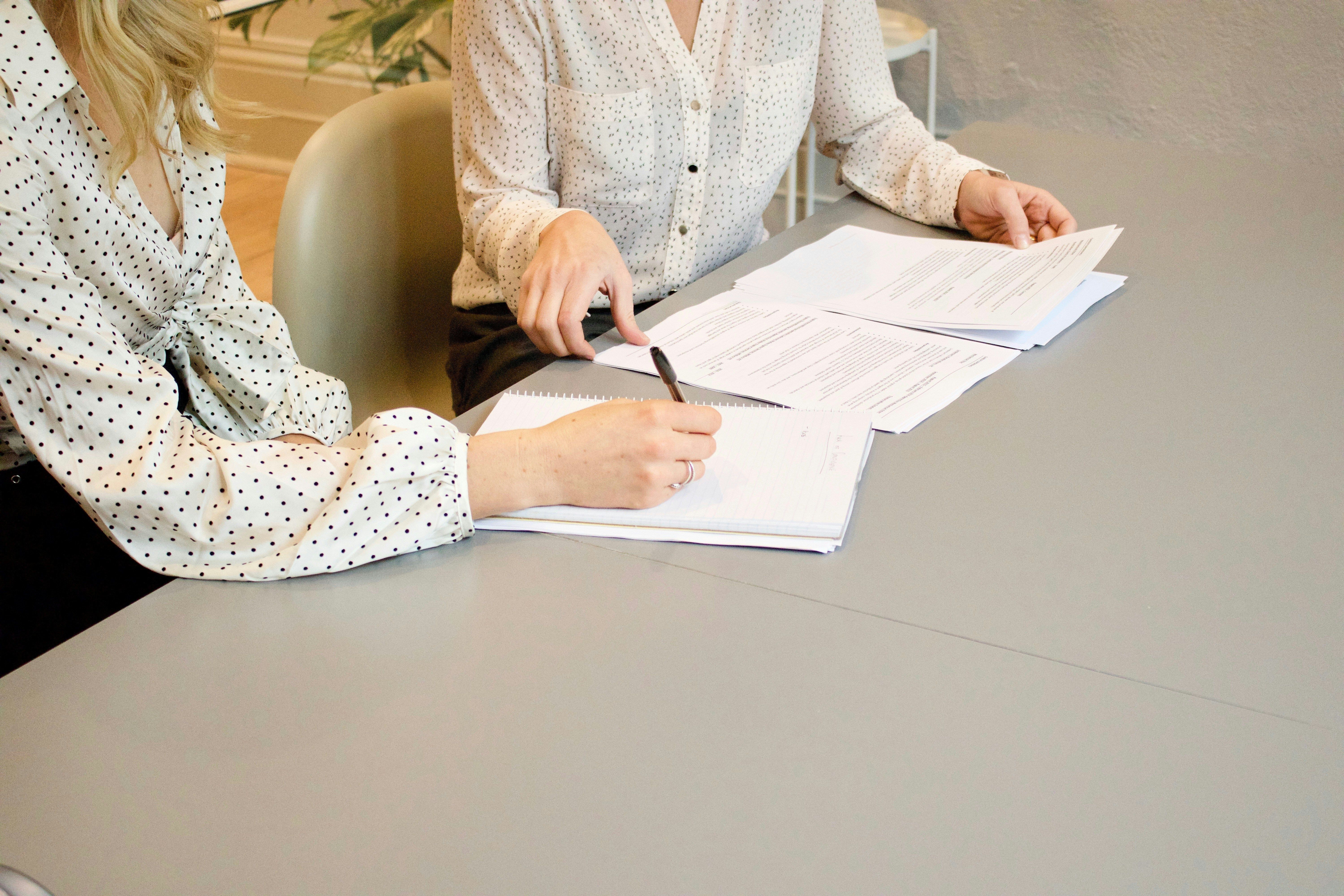 Person filling out paperwork