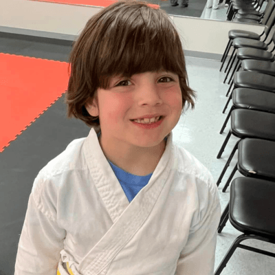Thanks to Lucy's Love Bus, Nolan receives funding to participate in karate where he gains confidence and strength