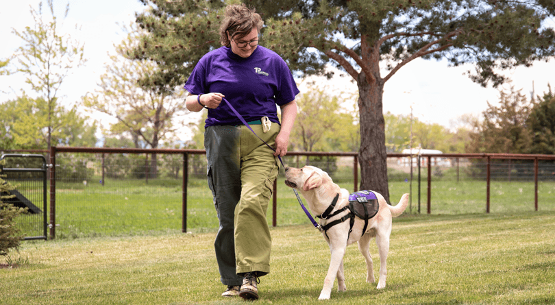 Volunteer with Service Dog in Training