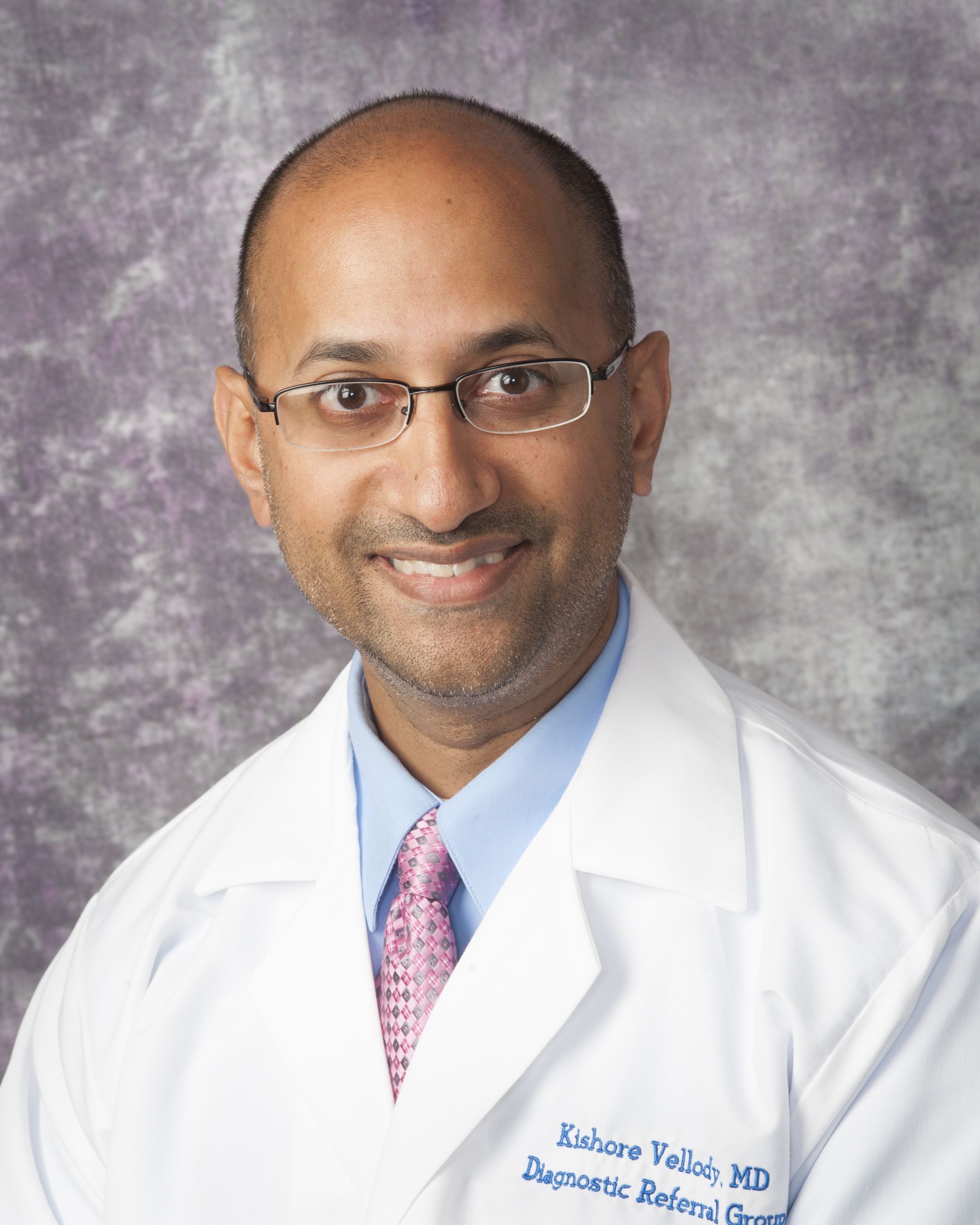 Kishore Vellody, MD